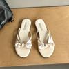 Super soft flat-bottomed French fairy wind small cool slippers female 2025 new summer wear bow beach sandals
