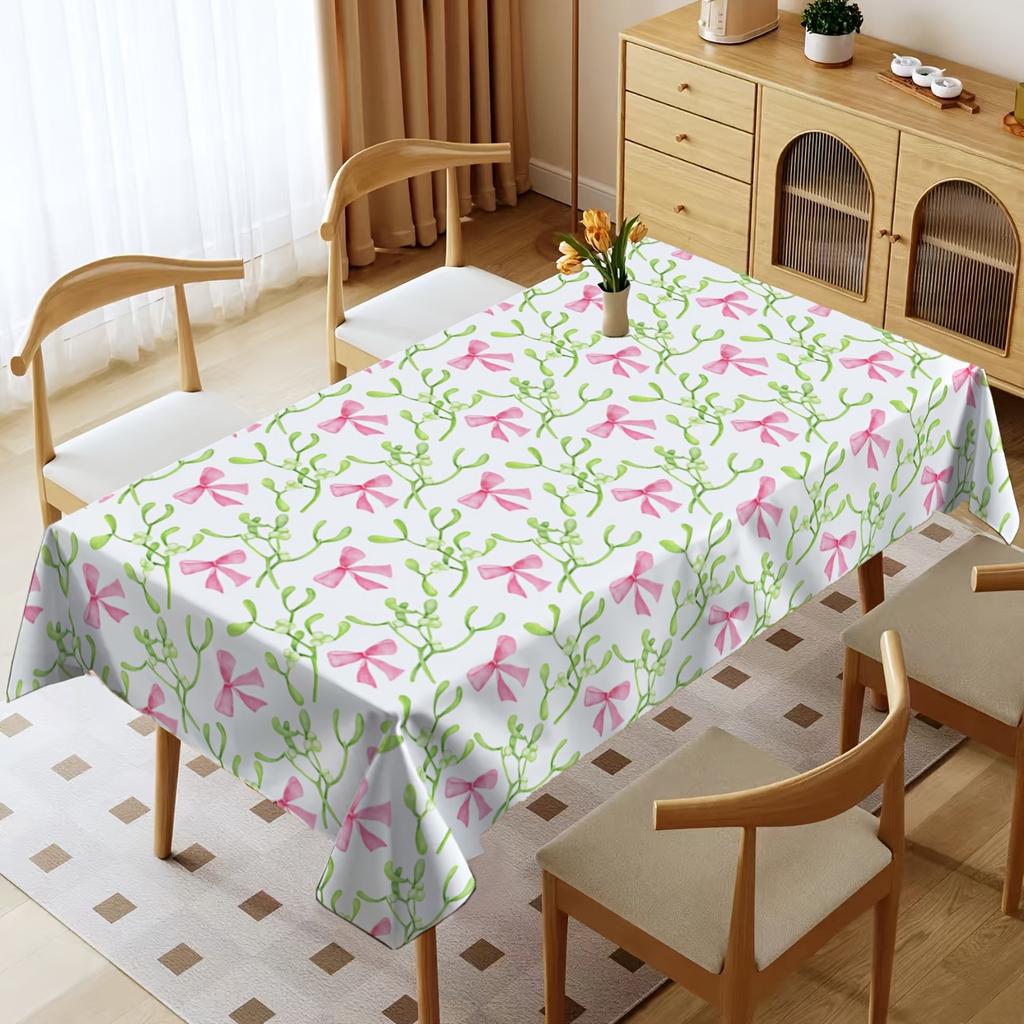 A Rectangular Tablecloth with a Bow Pattern, Suitable for Decorating Dining Tables. It Is Machine Washable And Can Be Used Indoors And Outdoors, Perfe