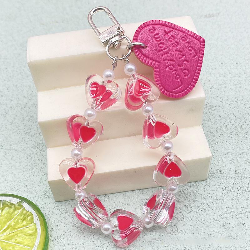 Браслет с хрустальным сердечком любви, защита от потери, чехол для мобильного телефона, ремешок на запястье, брелок для автомобиля, милый телефонный шарм
