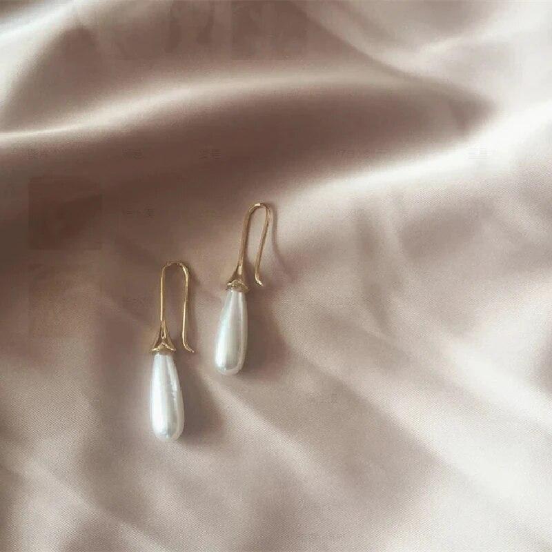 1 пара роскошных серег с опалом, имитацией жемчуга, стеклянными бриллиантами, из сплава с золотым покрытием, с прохладным ветром