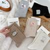 Autumn and Winter New Korean-style Knitted Women's Mid-calf Cotton Socks with Yarn, Animal Tags, and Stacked Letters