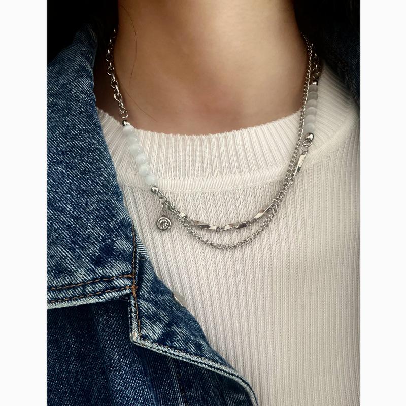 Gage Niche Women's Titanium Steel Necklace with Cat's Eye Stone and Clavicle Chain Trend.