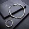 Winding pearl necklace for men, niche design, versatile bracelet for women, personalized high-end sweater chain, fashion accessory