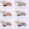 Fashion Women Shiny Full Rhinestone Hollow Peacock Brooch Pin Wedding Jewelry ARI