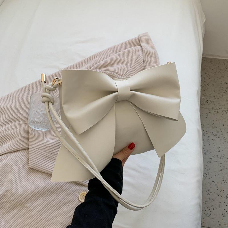IELGY fresh and cute bowknot solid color casual shoulder bag