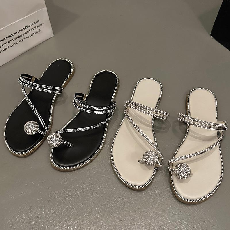 Стразы тонкий ремешок плоская подошва набор пальцев шлепанцы для женской летней носки новые модные универсальные юбка красивые крутые шлепанцы