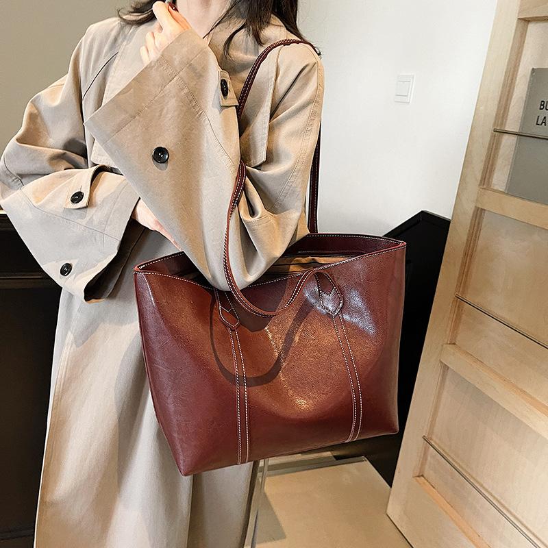 Сумка-тоут премиум-класса большой вместимости, женская новая популярная универсальная сумка через плечо, ретро-сумка для通勤