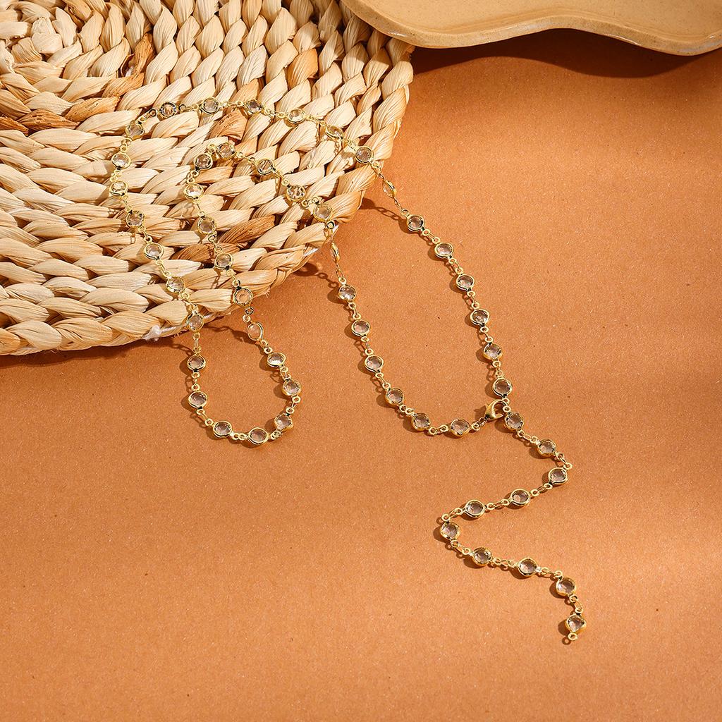 Ожерелье для женщин Длинное простое ожерелье в форме Y с кисточками Высококлассное чувство темперамента Универсальное ожерелье в форме Y с кристаллами Элегантное ожерелье