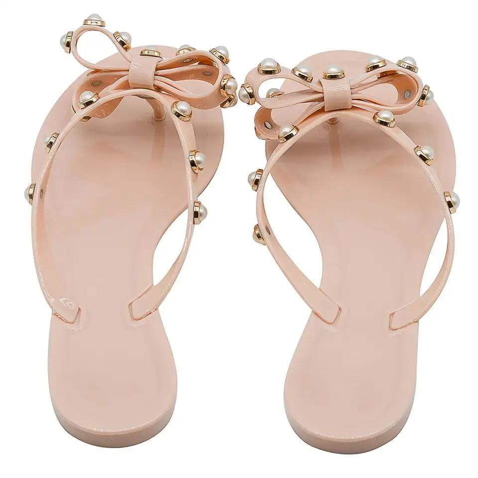 Тапочки женские шлепанцы лето снаружи 2024 новые женские сандалии с бабочкой и елочкой жемчужные тапочки желейные пляжные туфли 41