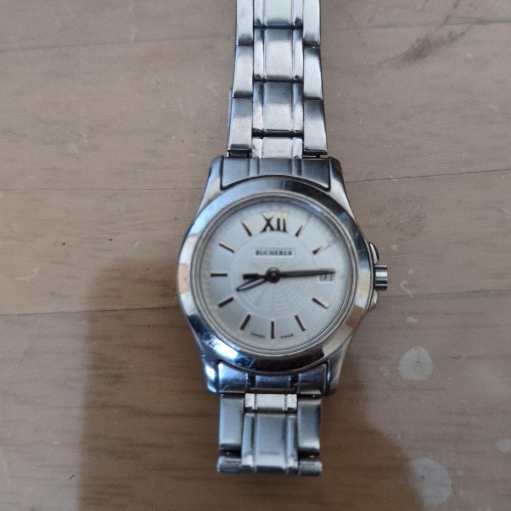 Б/у серебряные аналоговые часы Bucherer