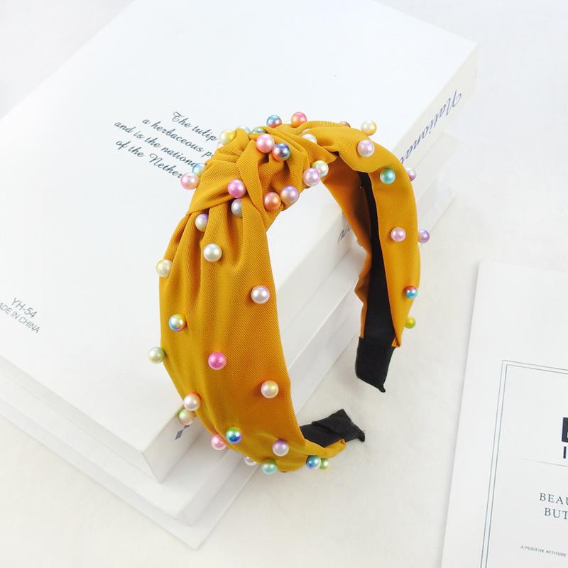 Весна и лето цветной жемчужный узел давление повязка на голову мода уличный снимок широкий край девушка тренд повязка на голову