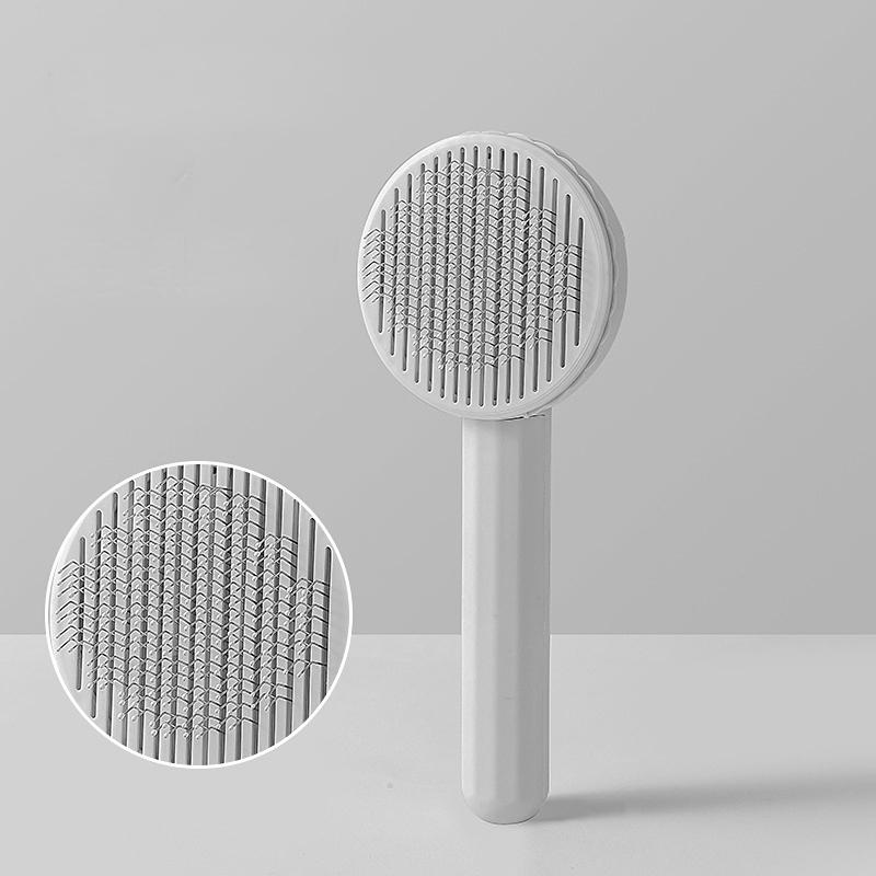 Расческа для удаления волос домашних животных Macaron Расческа для чистки кошек Круглая игольная расческа из нержавеющей стали для собак и кошек Массажная чистая плавающая щетка для волос