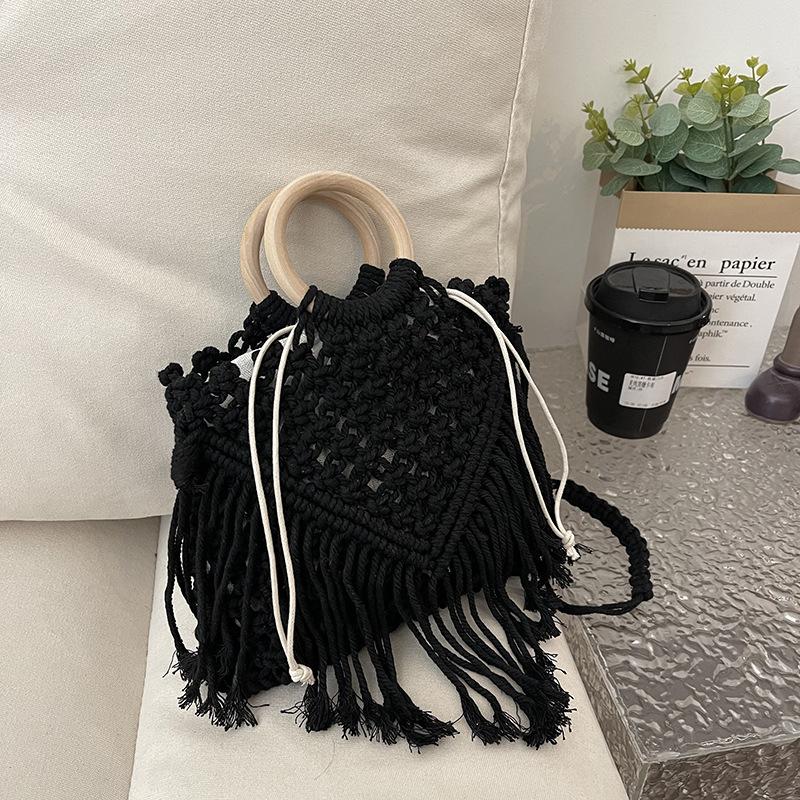 Bohemian fringed portable small bag women's 2025 new spring and summer hollow shoulder woven bag crossbody straw bag