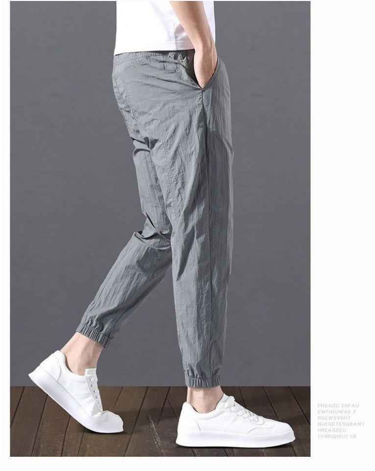 2023 Men's Korean-Style Ice Silk Casual Pants, Quick-Drying, Trendy, Loose-Fit Nine-Point Sports Pants for Summer.