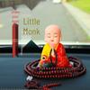 TikTok Solar Monk Car Ornament: Nodding Zen Chanting Figurine