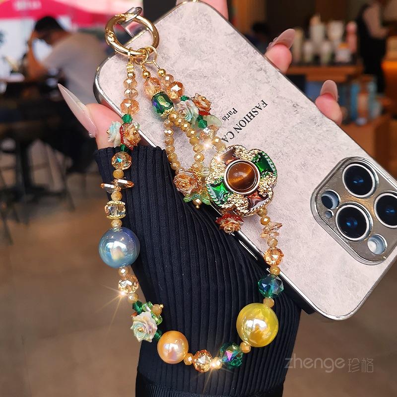 Light luxury mobile phone chain pendant women's high-value boutique handmade beaded wrist rope short outdoor travel