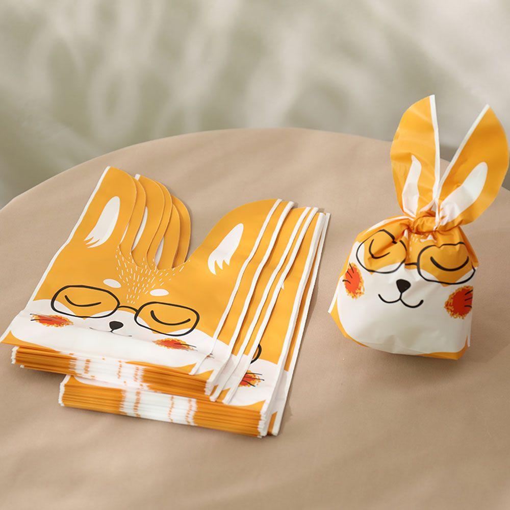 50 шт. Новые пасхальные картонные мешочки с ушками кролика, пластиковые мешочки для конфет в виде животных для детей, упаковка для печенья на день рождения, подарки своими руками