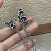 RUI RUI YU Asymmetrical Black Butterfly Wing Earrings Women's New Fashion Earrings Popular Design Tassel Jewelry