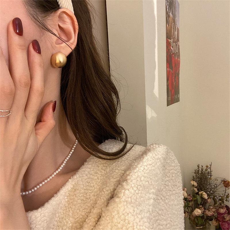 Круглые серьги из матового металла