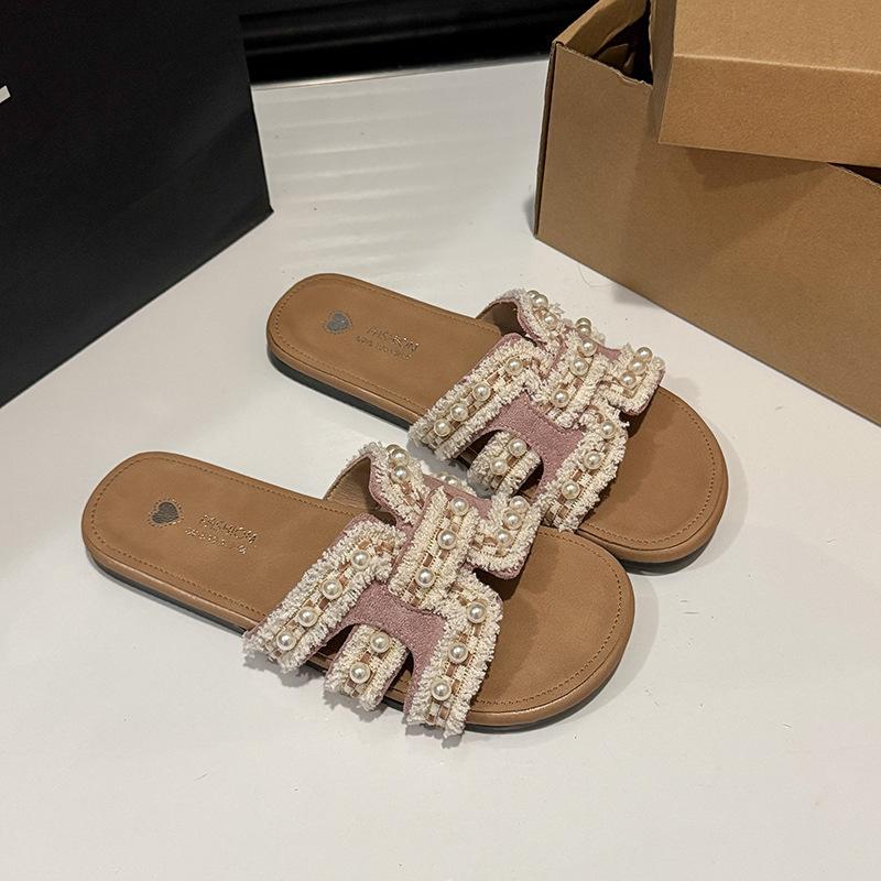 2025 лето новые тапочки на плоской подошве в стиле Сяосянфэн женские весенние с мягкой подошвой фея универсальные жемчужные пляжные сандалии