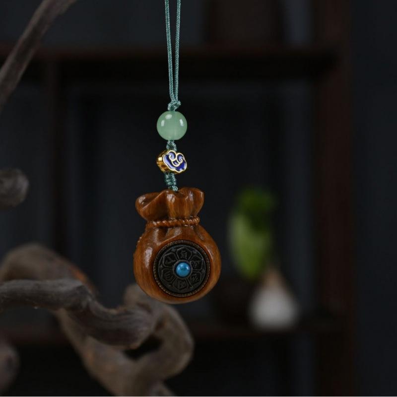 Twelve Zodiac Animal Charms Green Sandalwood Set: Rat, Ox, Tiger, Rabbit, Dragon, Snake, Horse, Sheep, Monkey, Rooster, Dog, Pig.