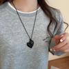Bohemian Ethnic Distressed Bow Metal Necklace with Versatile Long Round Pendant 2025