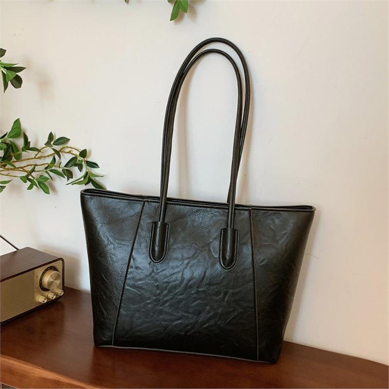 Корейская версия модной женской сумки-тоут большой вместимости 2025 новая простая повседневная сумка через плечо для поездок на работу универсальная портативная женская сумка