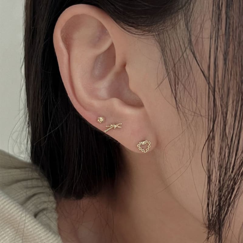 youngglow 14k tie ribbon piercing