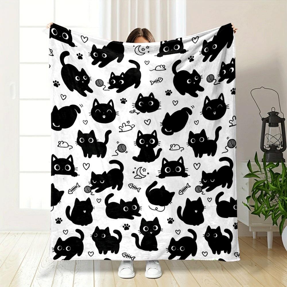 Cute black cats with playful poses, pawprints, hearts, and toys. for all seasons blanket lunch break throw gift