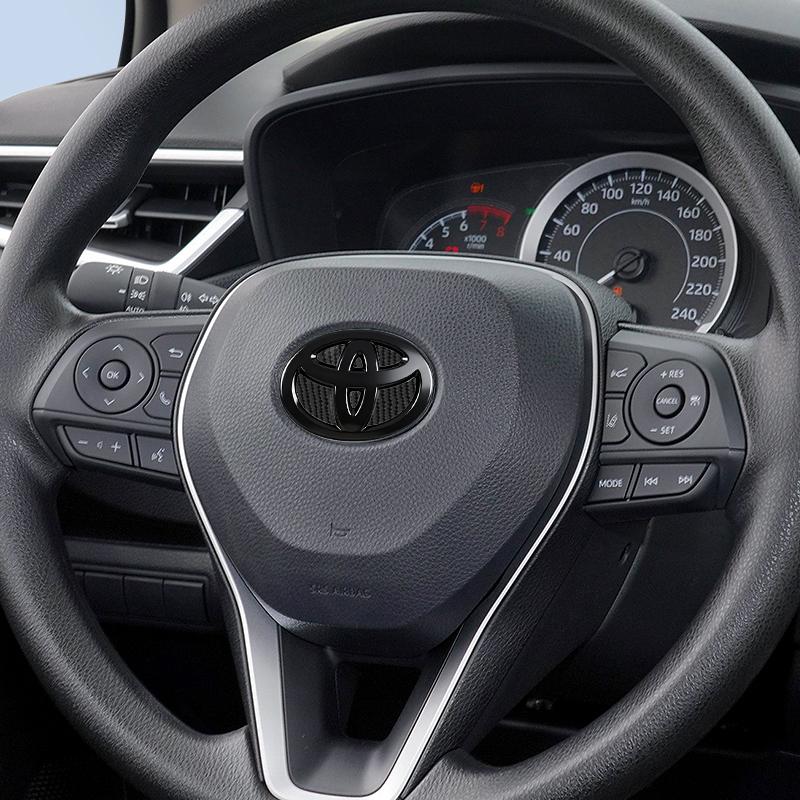 DCBQ5 1PC ABS Car Steering Wheel Emblem Badge Sticker Compatible for Toyota Hilux Prius Avensis Auris Verso Corolla Camry Accessories