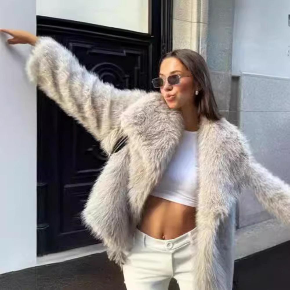 Осень и Зима Новая Женская Одежда Лисий Мех Черное Пальто Женский Искусственный Мех Высококлассный Топ