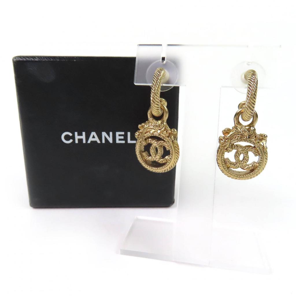 Отличный аксессуар - качающиеся серьги-подвески CHANEL COCO со шнуром, скрученным в жгут (бинауральный) золотой 05A Б/У