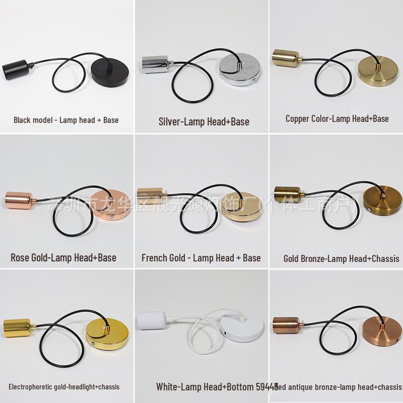 Золотой металлический подвесной светильник E27: Потолочная пластина, черно-белый подвесной провод, медный патрон натурального цвета.