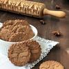 Wooden rolling pin with Christmas patterns and decorative engraving