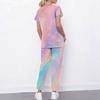 Women Plus Size Printed Scrub Set Crisscross Cutout Neck Short Sleeve Top Long Pants With Pockets