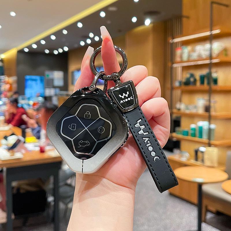 Совместимо с 26 моделями Wuling New Energy Aicheng: Модные Крутые, Ослепительные, Радостные Версии - Чехол для Ключей, Сумка для Автомобиля, Ракушка-Пряжка для Мужчин и Женщин.