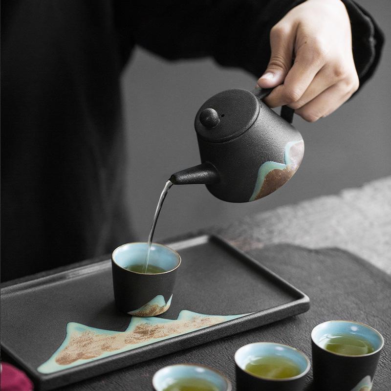 Black pottery Guanshan Kung Fu tea set, light luxury gifts, small set of gift boxes, living room home ceramic bubbles