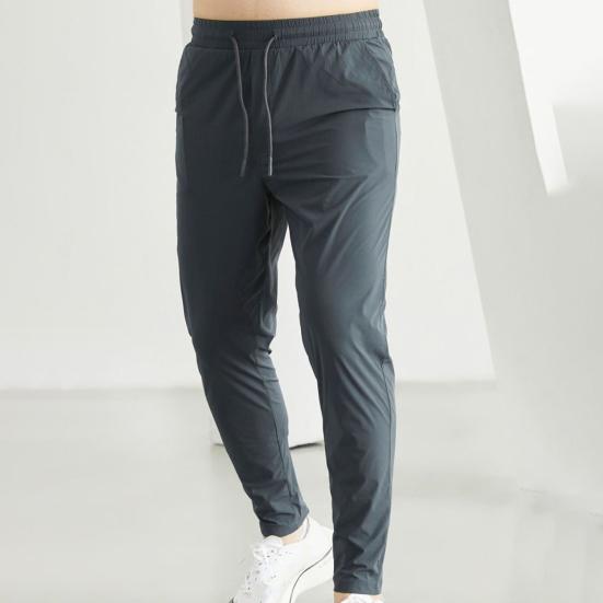 Men Jogging Pants Drawstring Elastic Waist Slim Fit Training Trousers with Pockets Solid