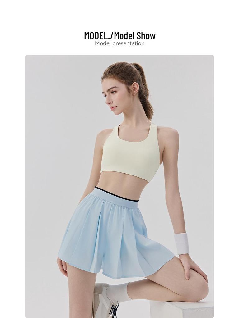 Pleated Women's Yoga Skort with Integrated Shorts and Pockets - Anti-Exposure Sportswear for Pilates.