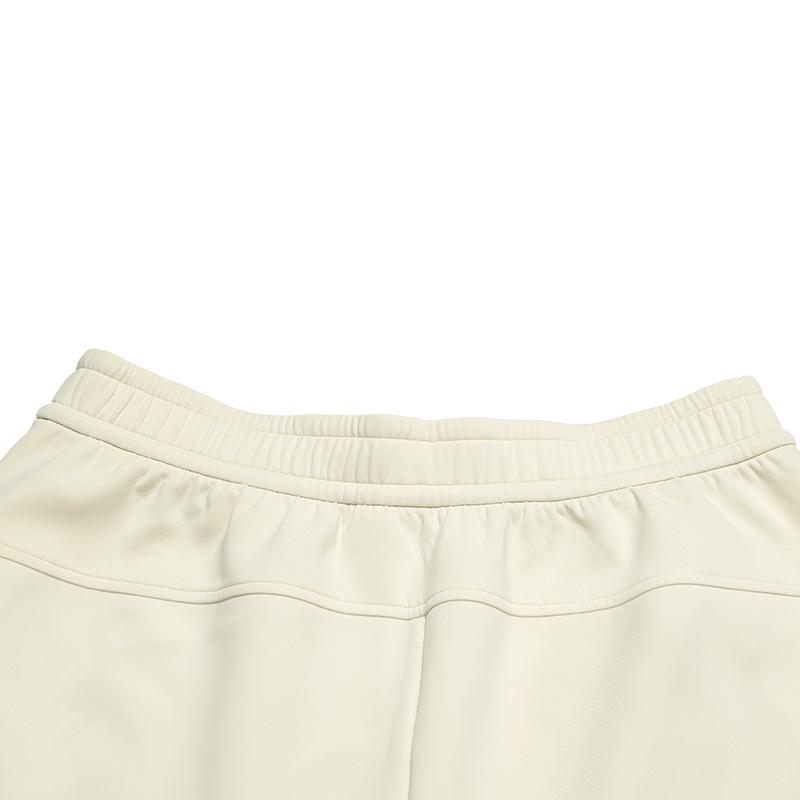 Fila Модная повседневная удобная универсальная эластичная трикотажная спортивная одежда серии Golf, женские брюки, цвет спаржа-белый A11W545613FIV