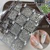 Набор для нейл-арта с стразами, 12 ячеек, с плоским и заостренным дном, с круглыми полупрозрачными цветными стразами для декора.