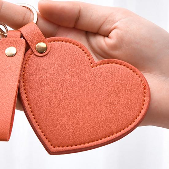 Зеркало для макияжа в форме сердца, водонепроницаемое, из искусственной кожи, зеркало для туалетного столика, брелок, портативное дорожное, ручное косметическое зеркало для женщин, подвеска для сумки