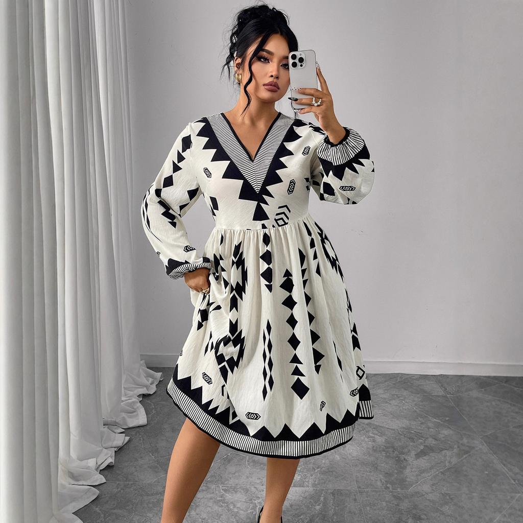 Foreign trade autumn and winter new dress large size fat mm printed bubble sleeve V-neck dress high waist and thin dress