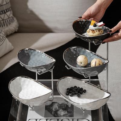 Керамическая тарелка с фруктами Легкая роскошная тарелка с фруктами Yuanbao с узором молотка Керамическая простая и модная помолвочная тарелка с фруктами высокой красоты для домашнего использования