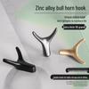Nordic Creative Zinc Alloy Ox Horn Wall-Mounted Coat Hook for Bathroom, Kitchen, or Entryway.