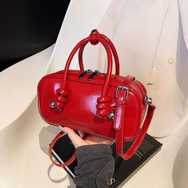 Сумка-бостон в высоком стиле, женская модная нишевая модель 2025, новая весенне-летняя сумка-мессенджер, портативная сумка для боулинга