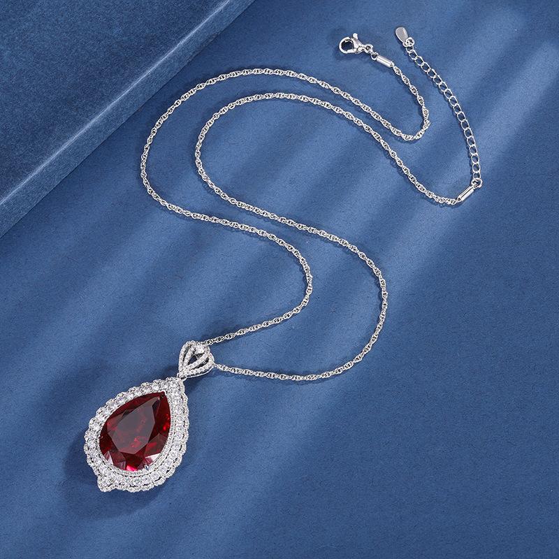 Ювелирные изделия Медное основание с золотым покрытием Имитация цвета Сокровище Большой кулон в виде капли воды Роскошная инкрустация Главный камень 18 * 25