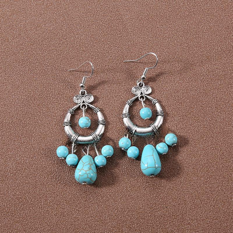 Богемные серьги-кисточки из бирюзового и красного тибетского металла с бусинами