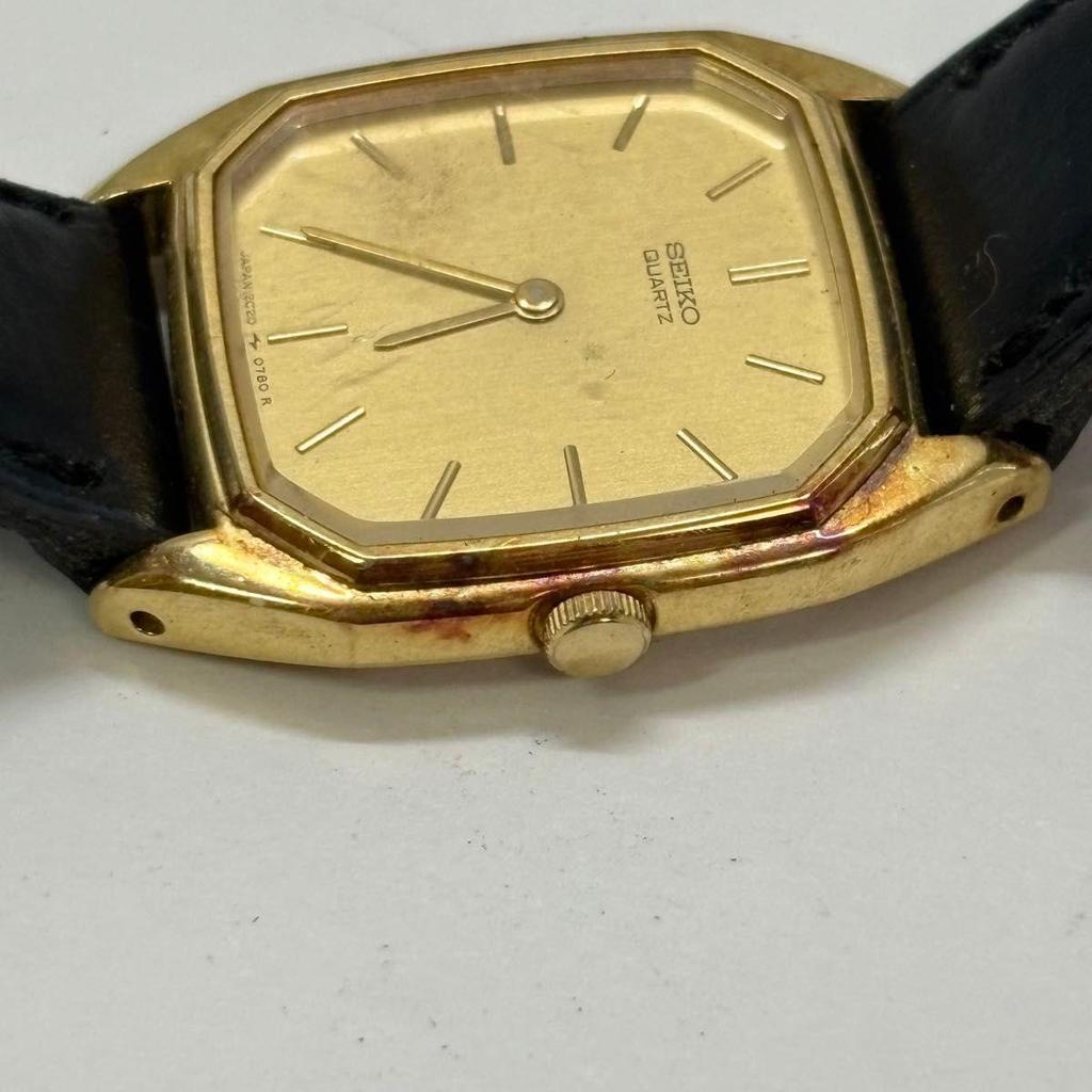 Б/у Кварцевые часы SEIKO 2C20-5370 Золотой циферблат Черный ремешок