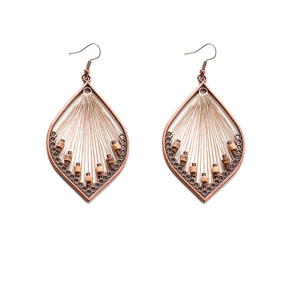 Винтажные богемные плетеные серьги с кисточками в нишевом лесном стиле